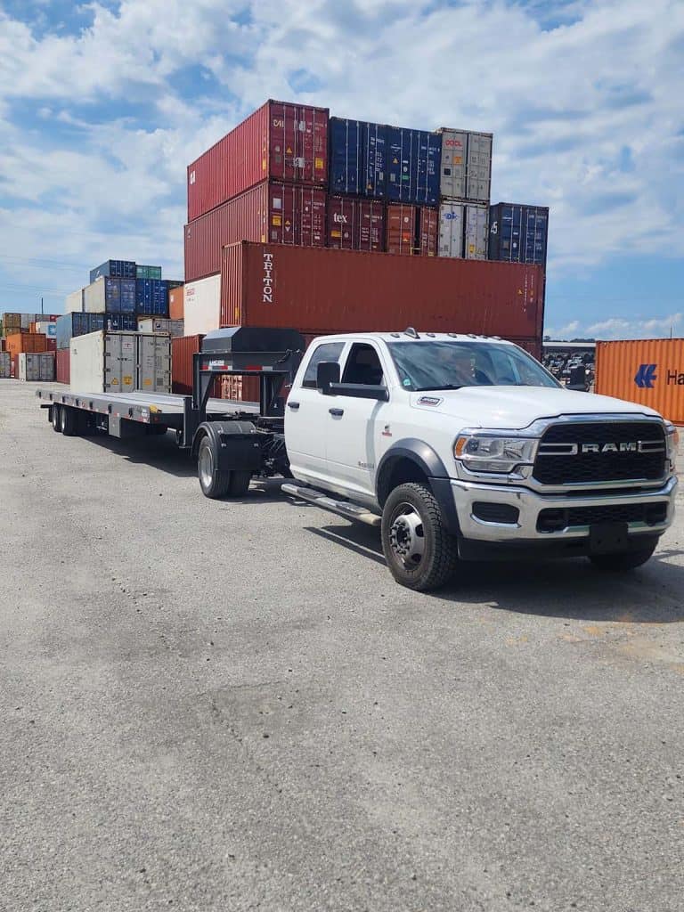 king hauling truck in lot.